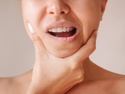 Lady has jaw pain