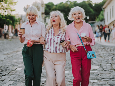 Senior women laughing on the town