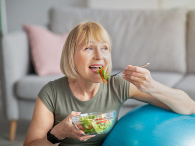 Woman eating a salad