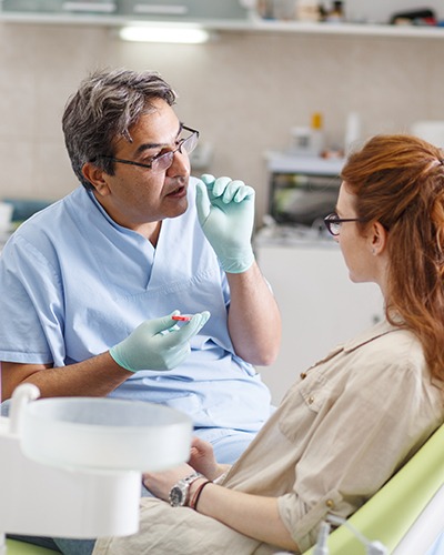 Dentist explaining treatment to patient