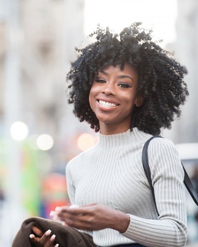 Woman smiling while out on the town