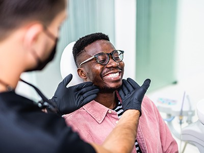Man smiling in the dental chair